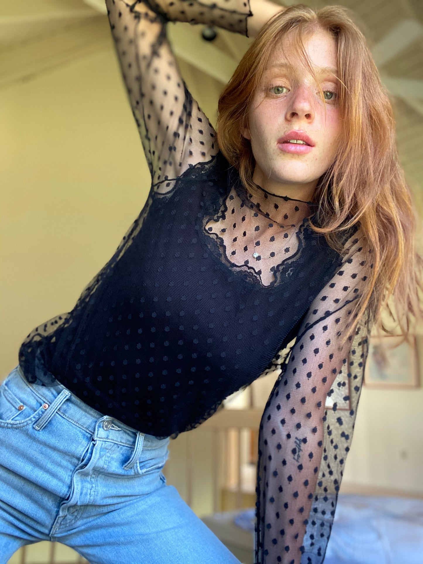 The "Clare" black sheer dot tulle top